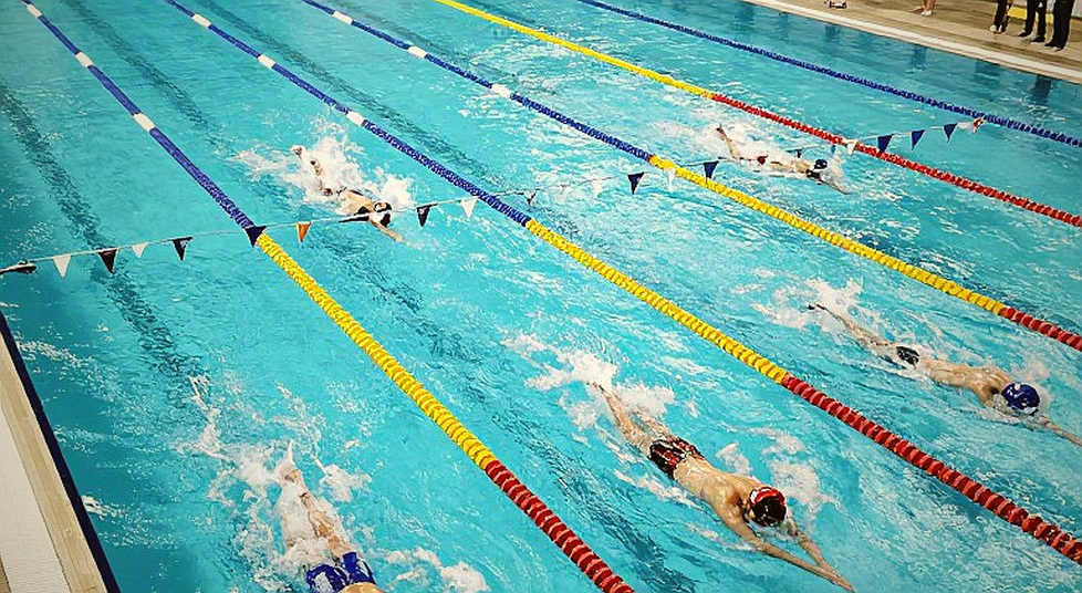 Vỏ bọc miễn phí: Khi các chương trình NCAA tìm đến HLV dạy nhào lộn không lương
